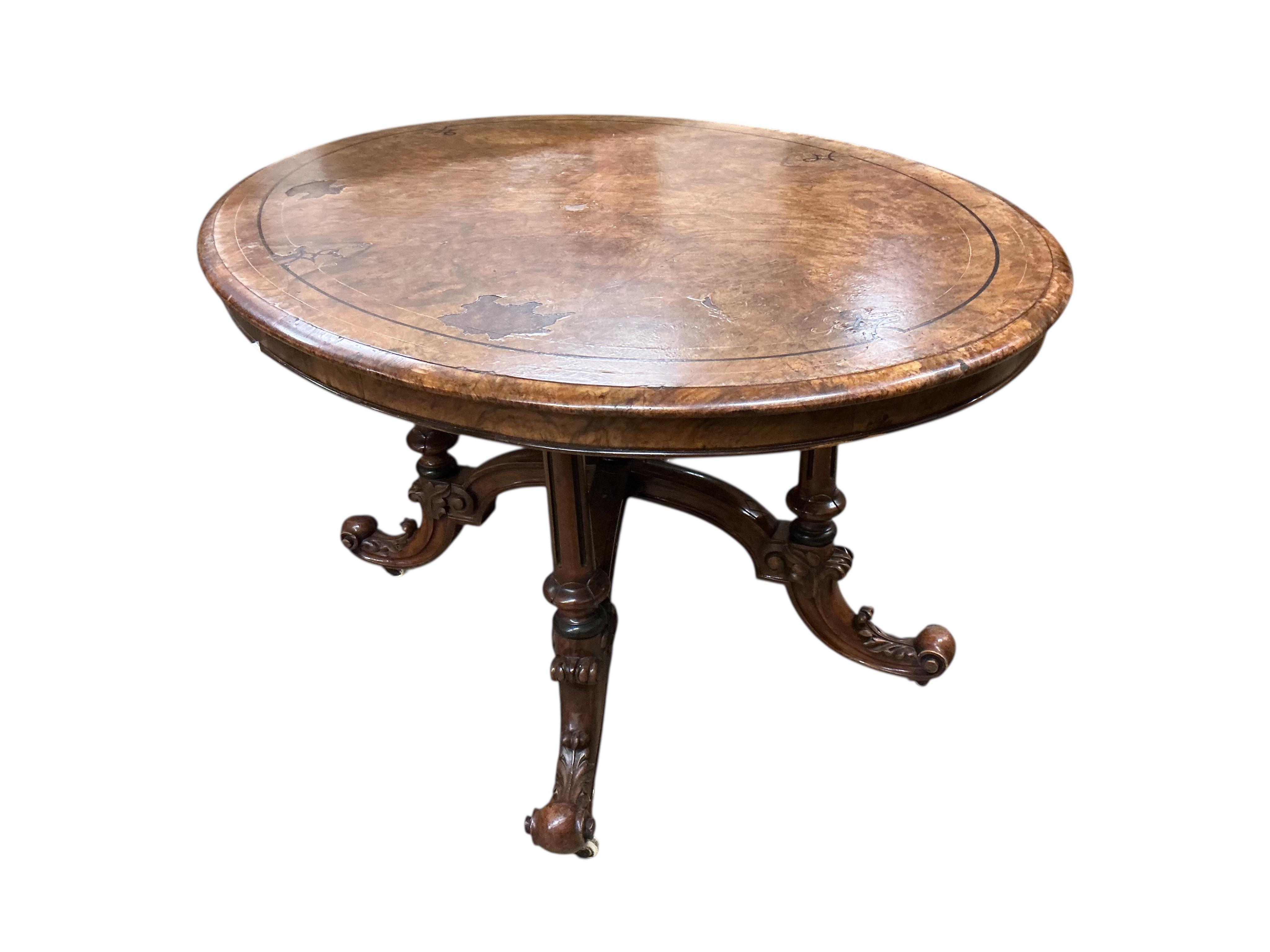 A late Victorian inlaid walnut oval loo table, width 130cm, depth 100cm, height 70cm